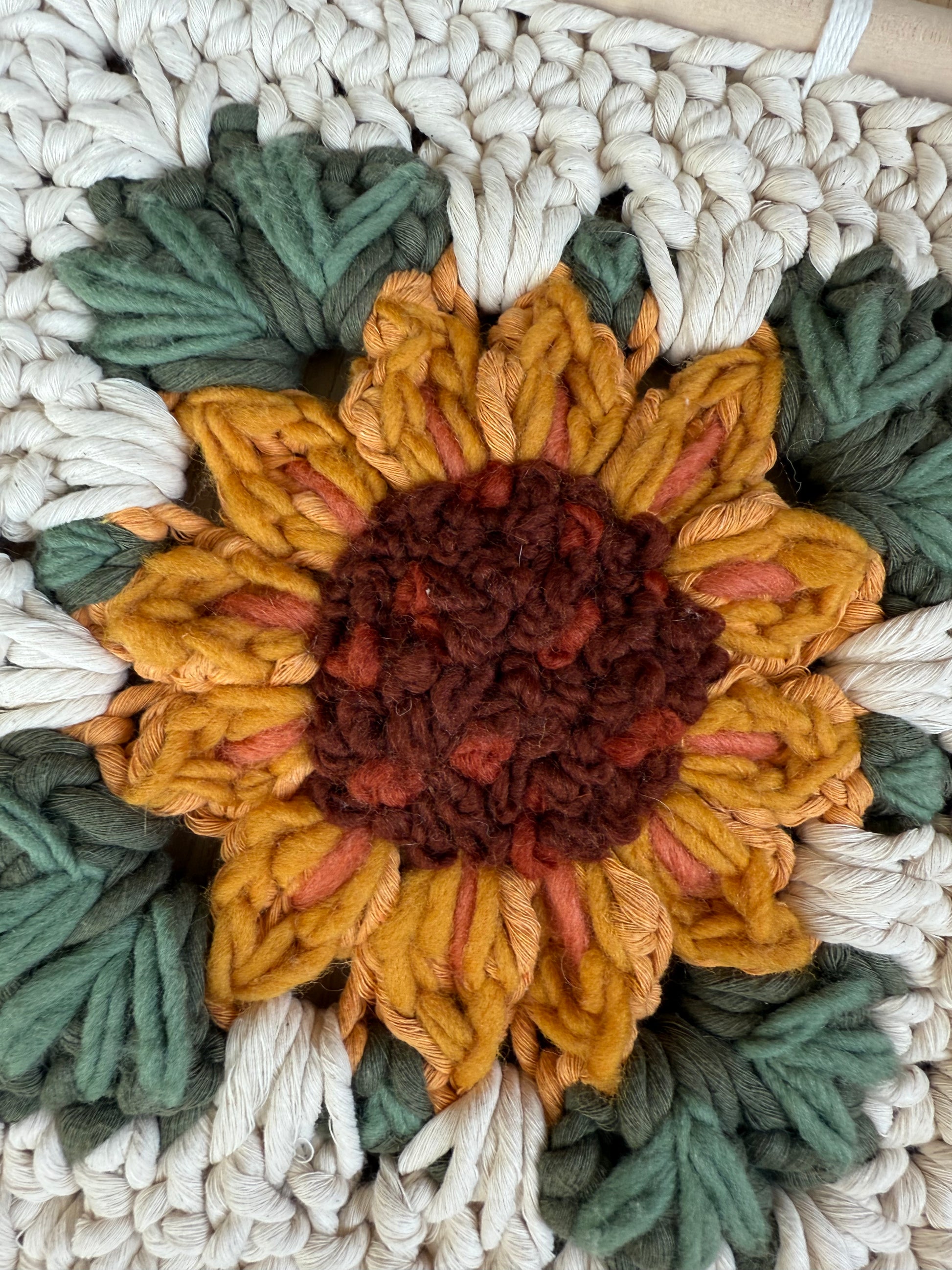Sunflower embroidered granny square with tassels